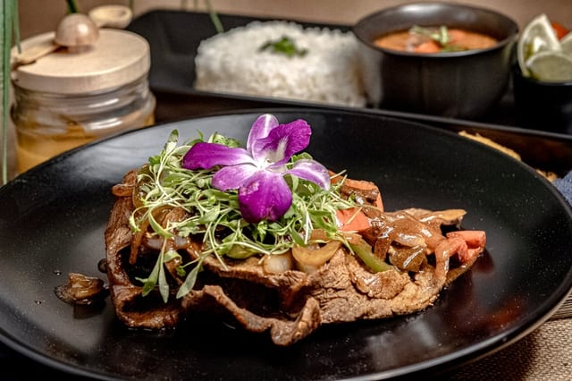 Bistec Encebollado.
